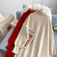 Le nouveau pull en tricot à col montant est ample et paresseux 5218