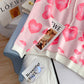 Pull rouge net love pull femme ample à capuche pull 5114 