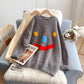 Pull ample à visage souriant Pull ample à visage souriant 4948