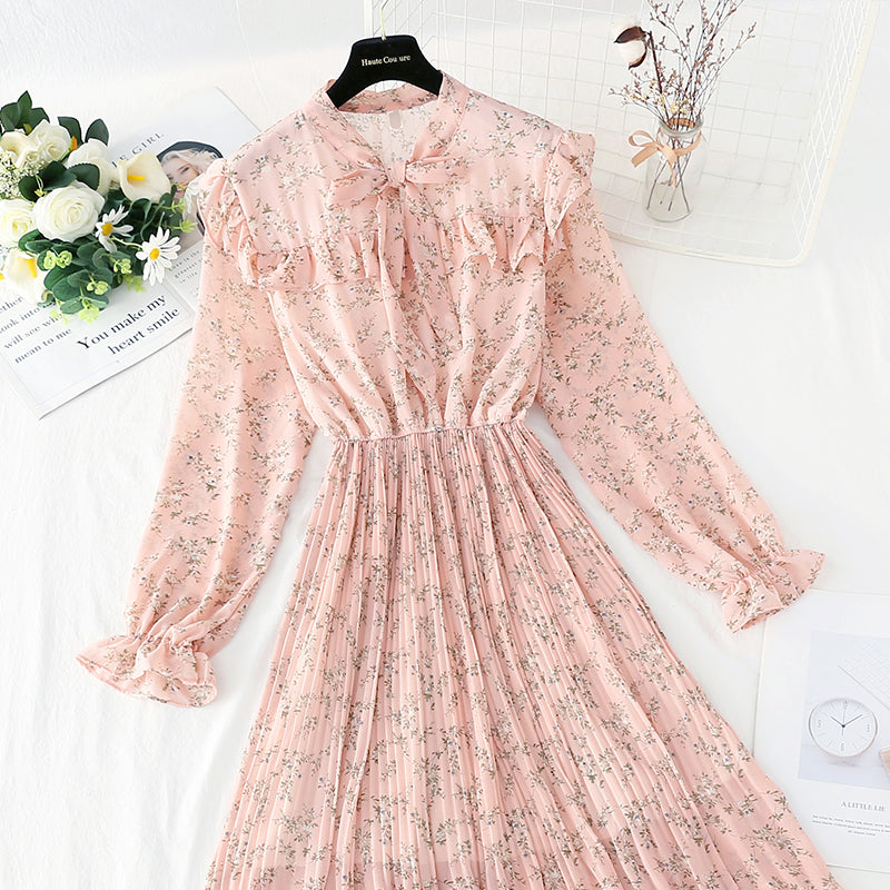 La robe en mousseline de soie à nœud montre un tempérament mince, une jupe florale plissée mince 4089