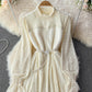 Robe en dentelle brossée à col montant matelassé en vison 3748