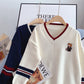 Pull col V ours brodé femme 4929