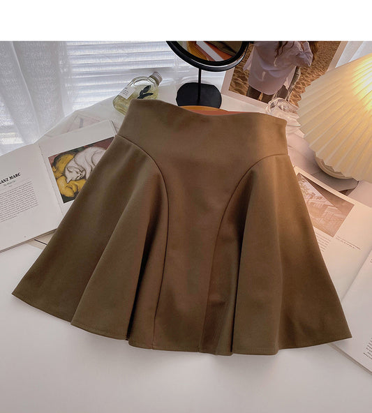 Korean fashion Hong Kong style leisure solid color anti light high waist skirt  5497