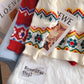 Pull vintage en jacquard rouge en laine grossière 5134